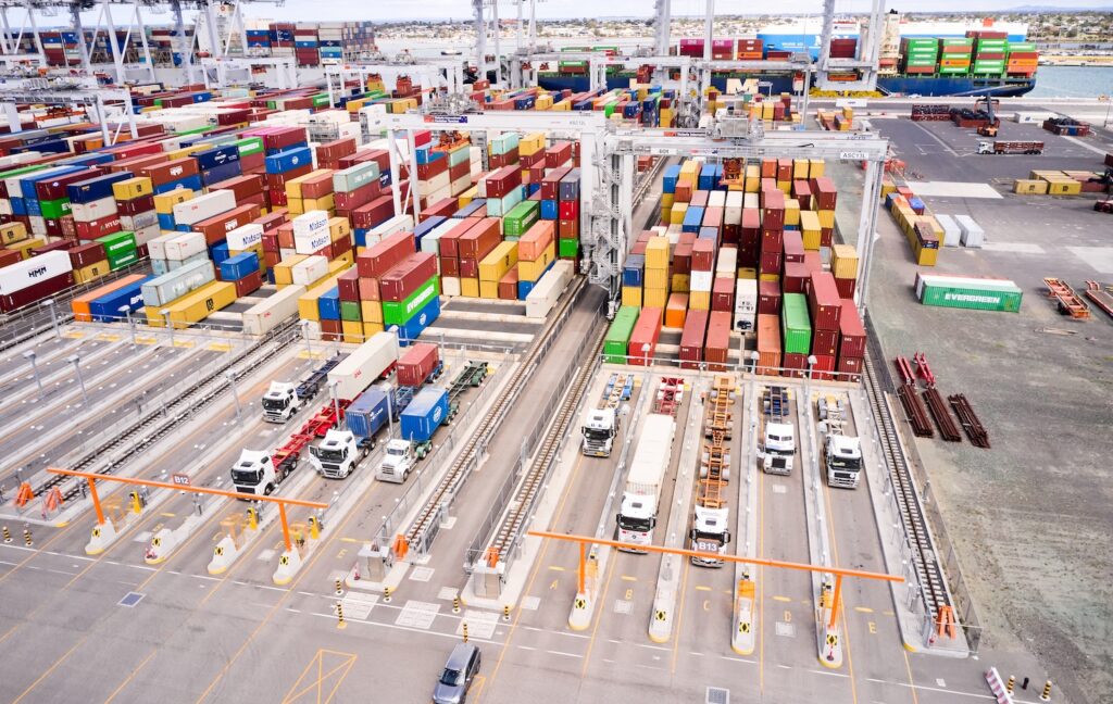 Container stacks, gantry cranes and trucks in a container terminal